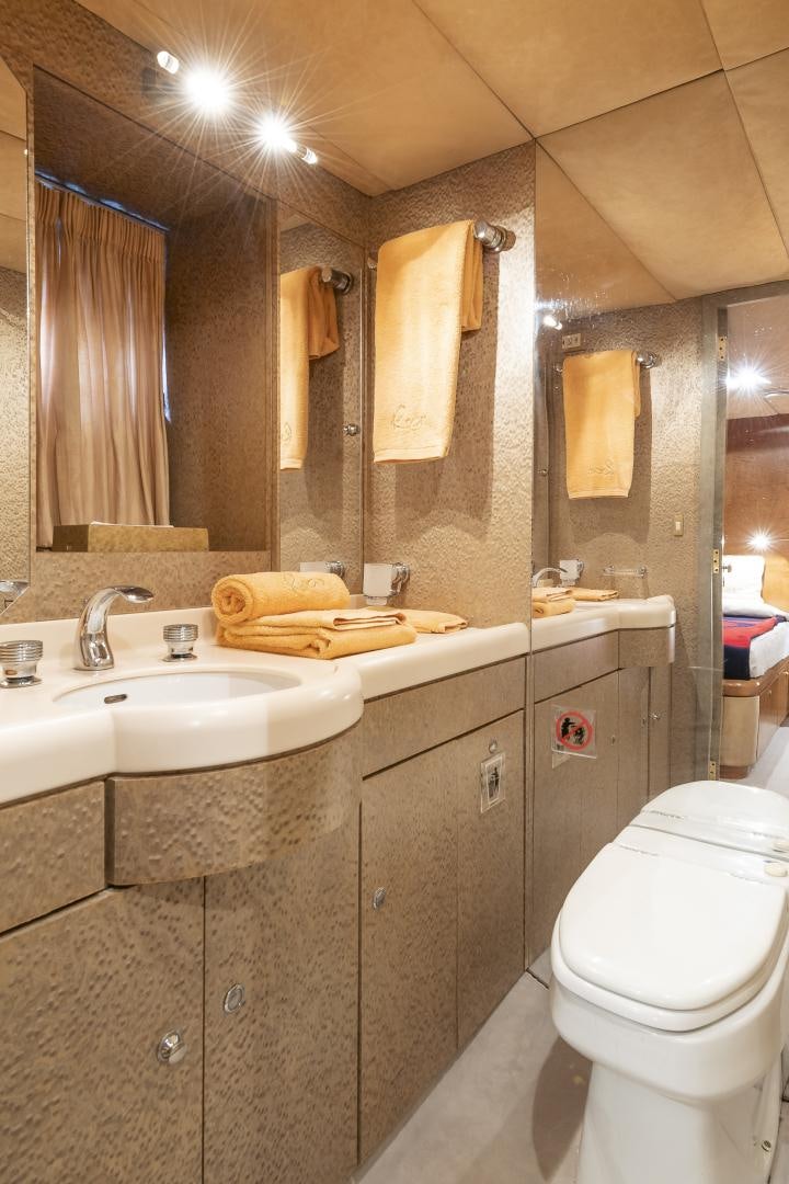 a bathroom with a sink and a toilet aboard ROCIO Yacht for Sale