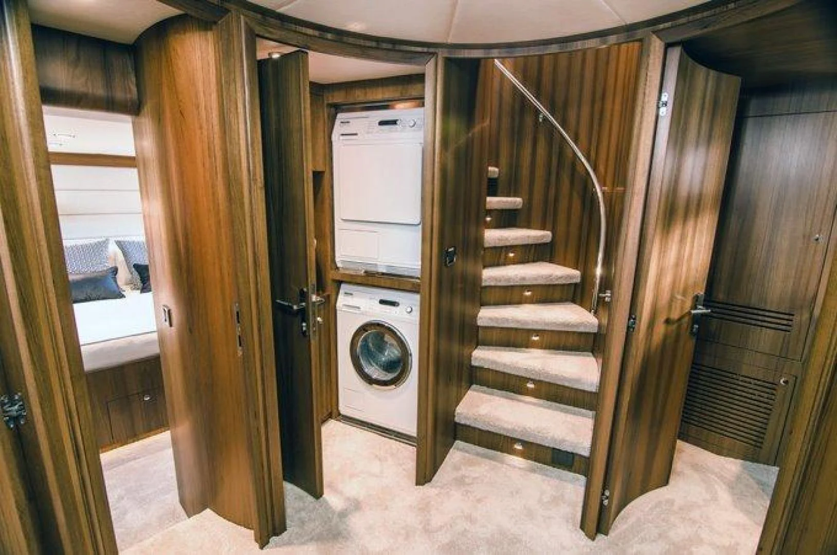 a room with a washer and dryer aboard JOHNSON 80' FLYBRIDGE W/FISHING COCKPIT Yacht for Sale