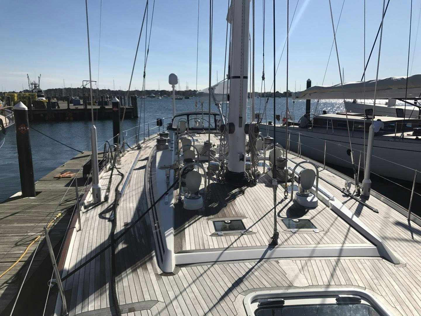 a deck with a deck and boats aboard METOLIUS Yacht for Sale