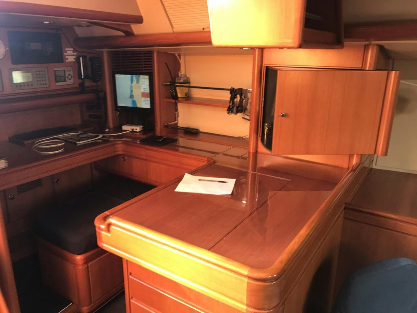 a room with a desk and computer aboard METOLIUS Yacht for Sale