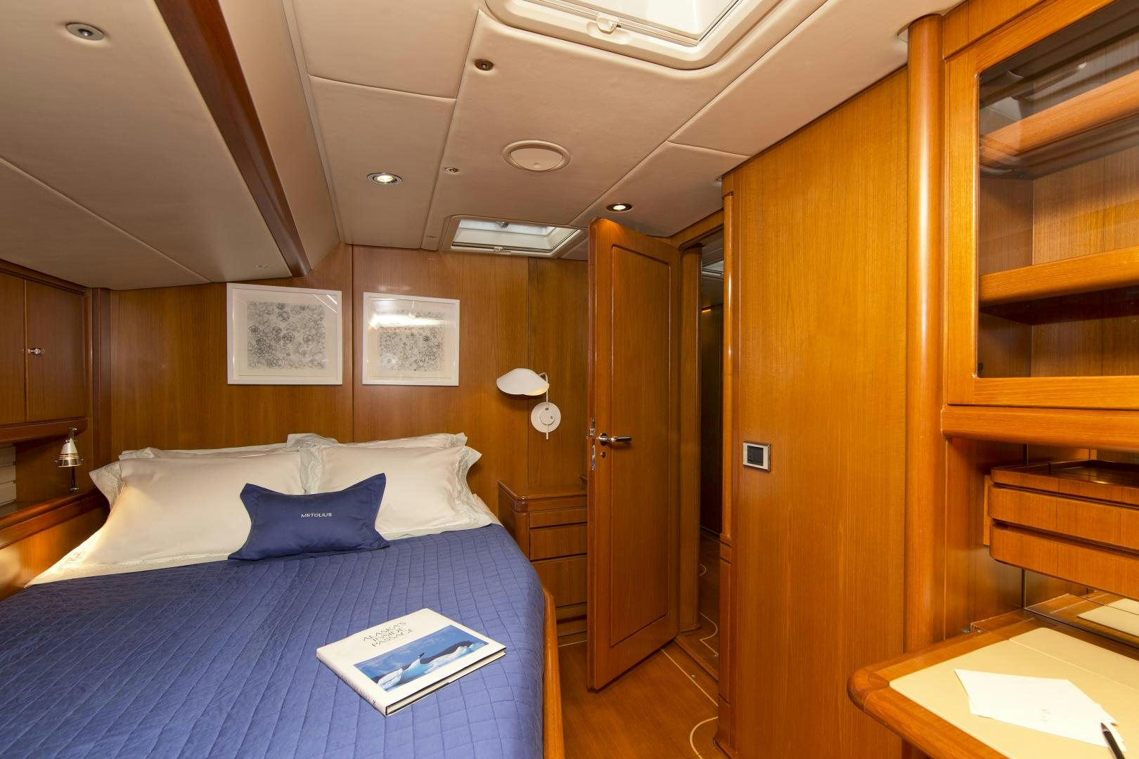 a bed in a room aboard METOLIUS Yacht for Sale