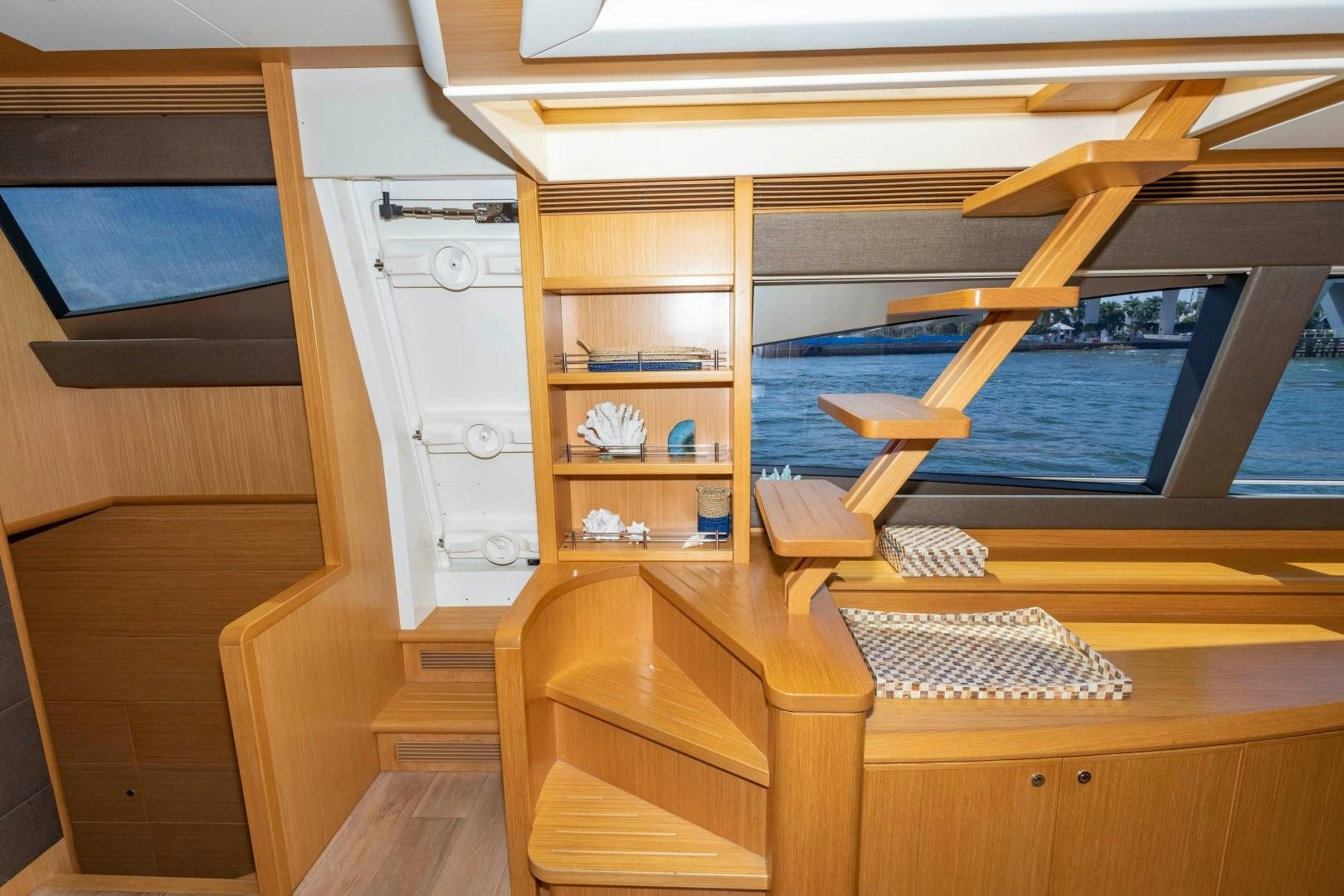 a room with a slide aboard MI RX Yacht for Sale