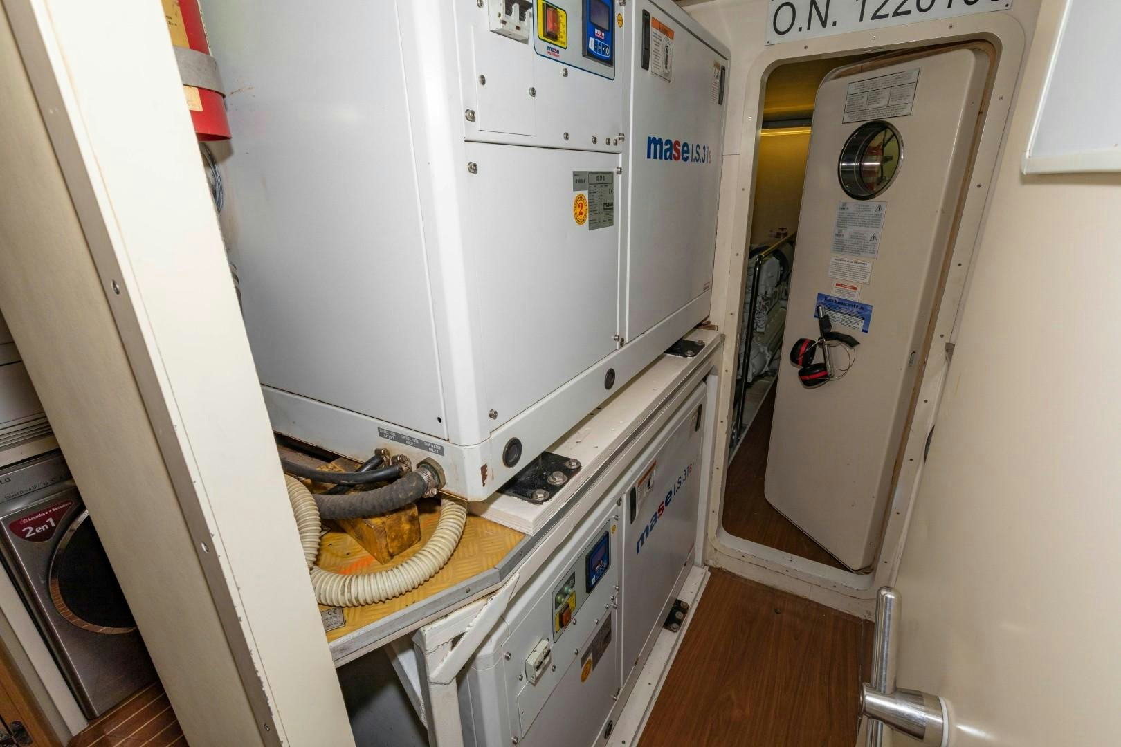 a machine with a door open aboard MI RX Yacht for Sale