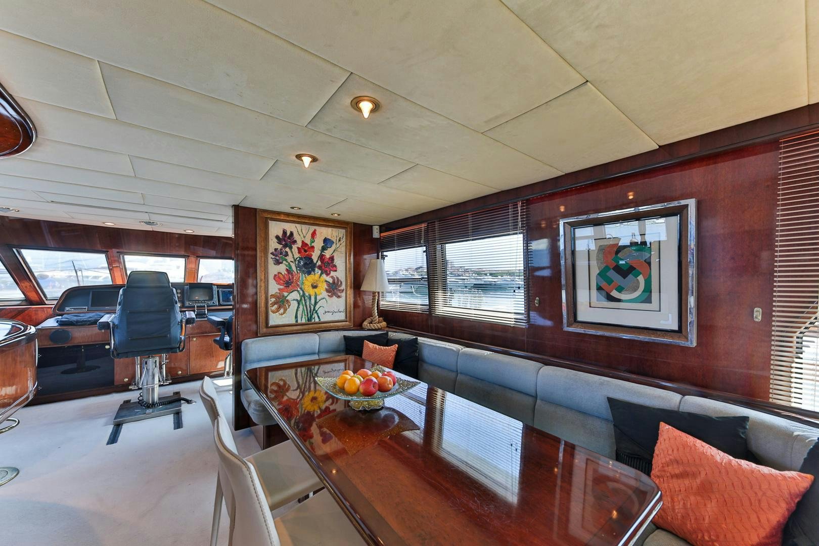 a room with a table and chairs aboard HAPPY DAZE Yacht for Sale