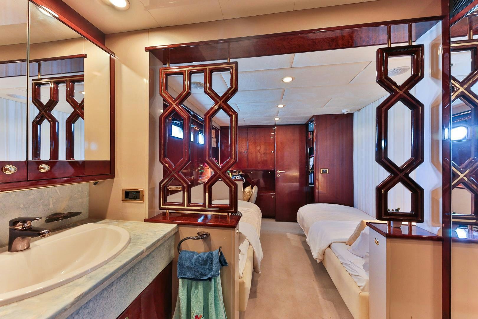 a bathroom with a sink and a mirror aboard HAPPY DAZE Yacht for Sale