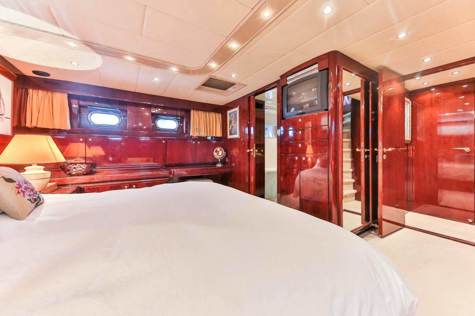a hotel room with a bed aboard HAPPY DAZE Yacht for Sale