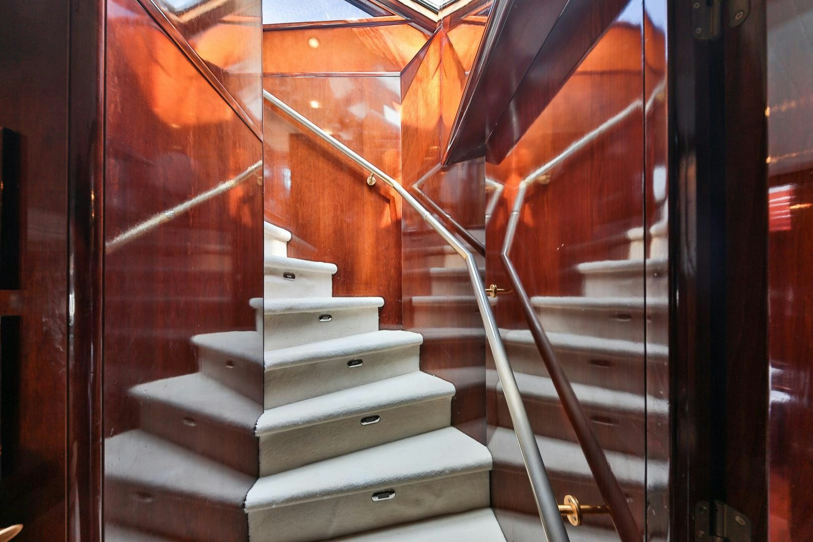 a set of stairs in a building aboard HAPPY DAZE Yacht for Sale