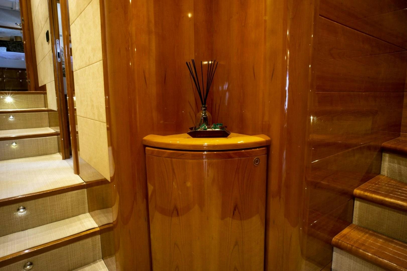 a wood table with a plant on top of it aboard NO NAME Yacht for Sale