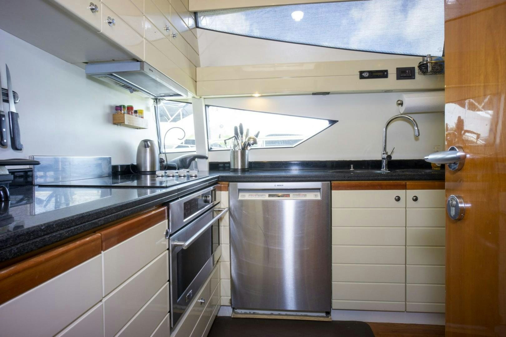 a kitchen with stainless steel appliances aboard NO NAME Yacht for Sale