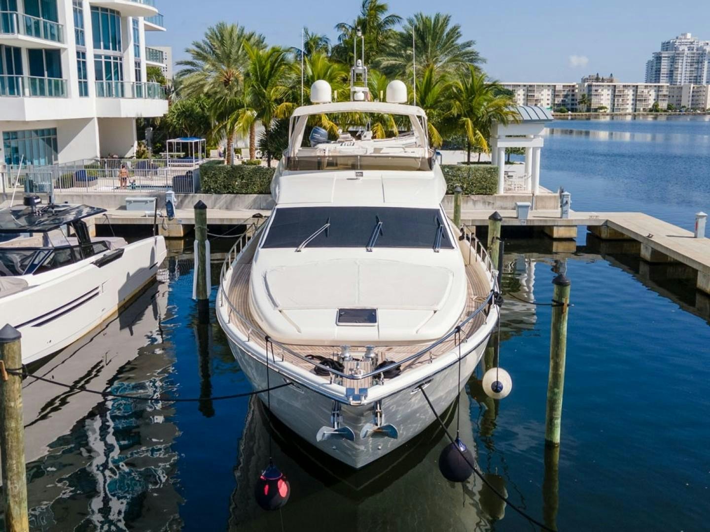 a boat docked at a pier aboard NO NAME Yacht for Sale