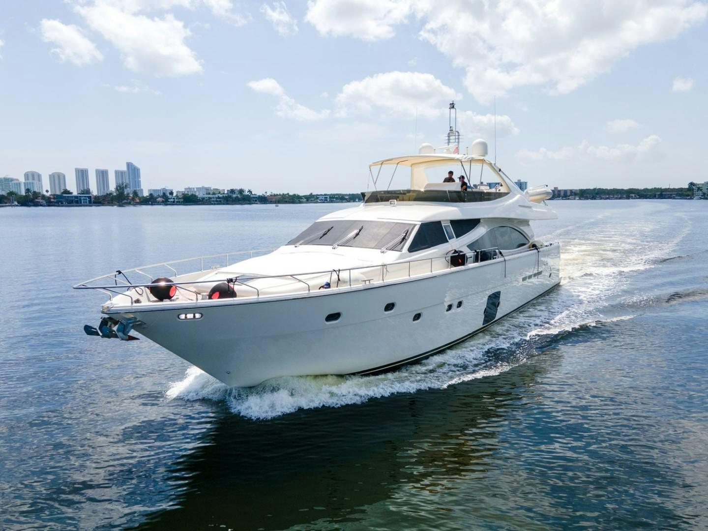 a white yacht on the water aboard No Name Yacht for Sale