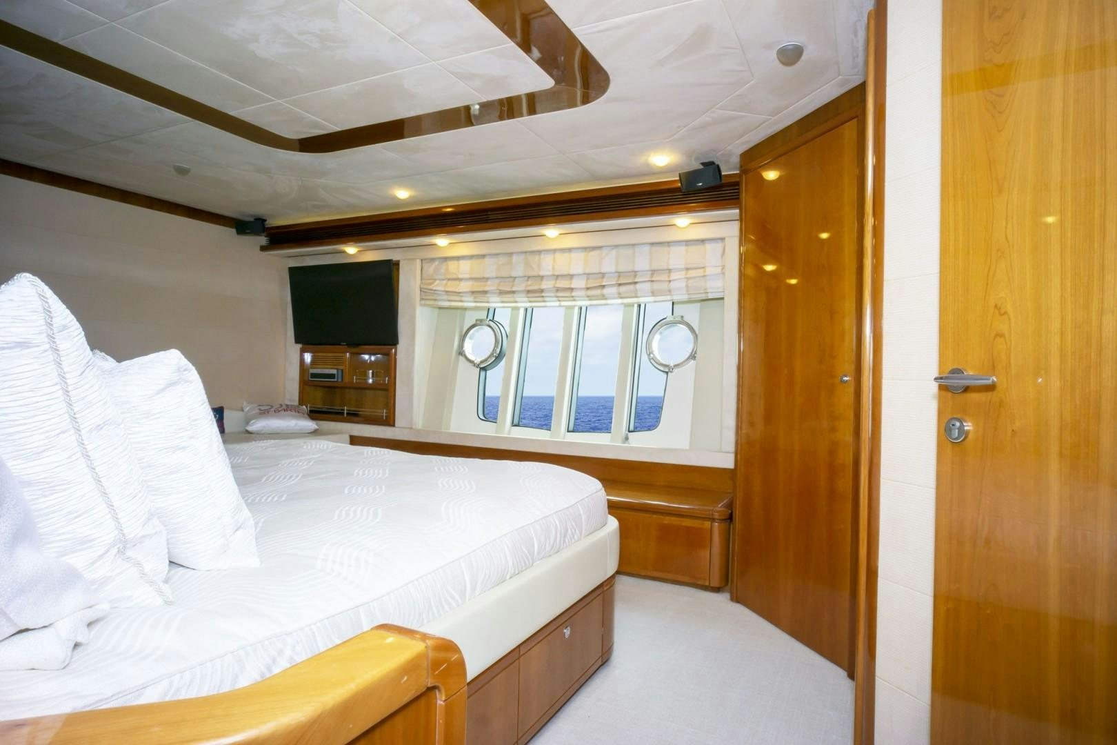 a room with a bed and a door aboard NO NAME Yacht for Sale