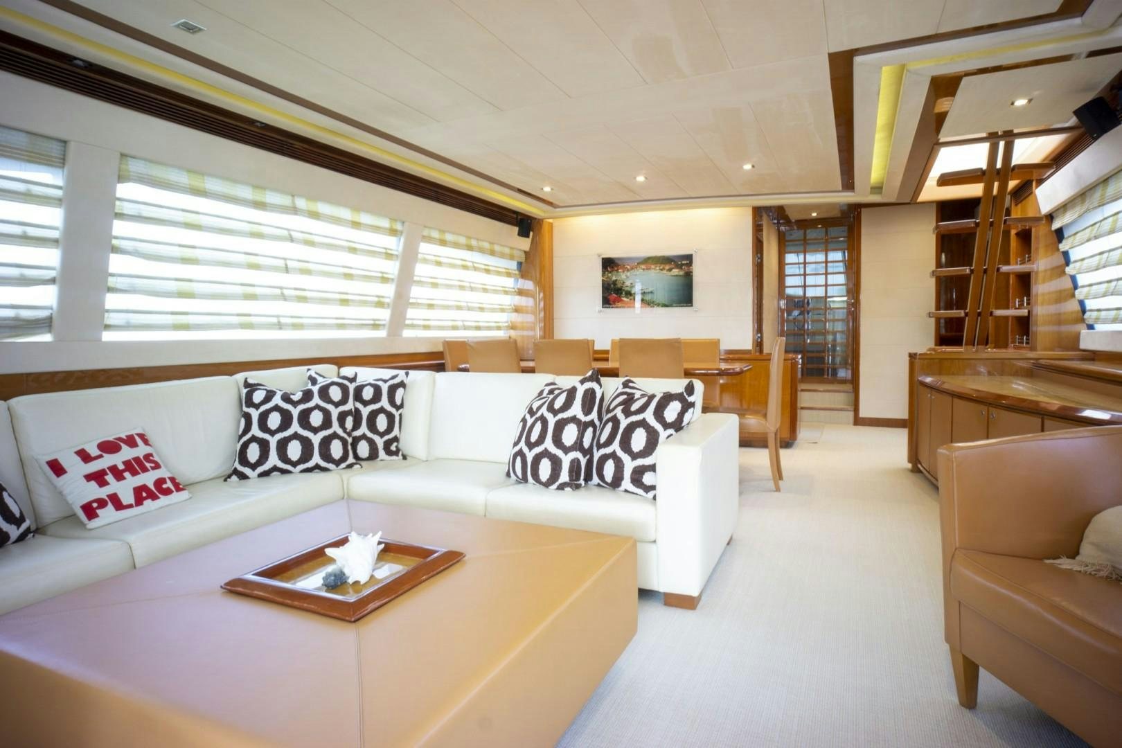 a living room with a couch and a table aboard NO NAME Yacht for Sale
