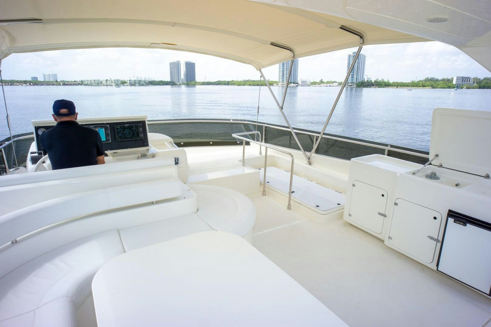 a person sitting on a boat aboard NO NAME Yacht for Sale