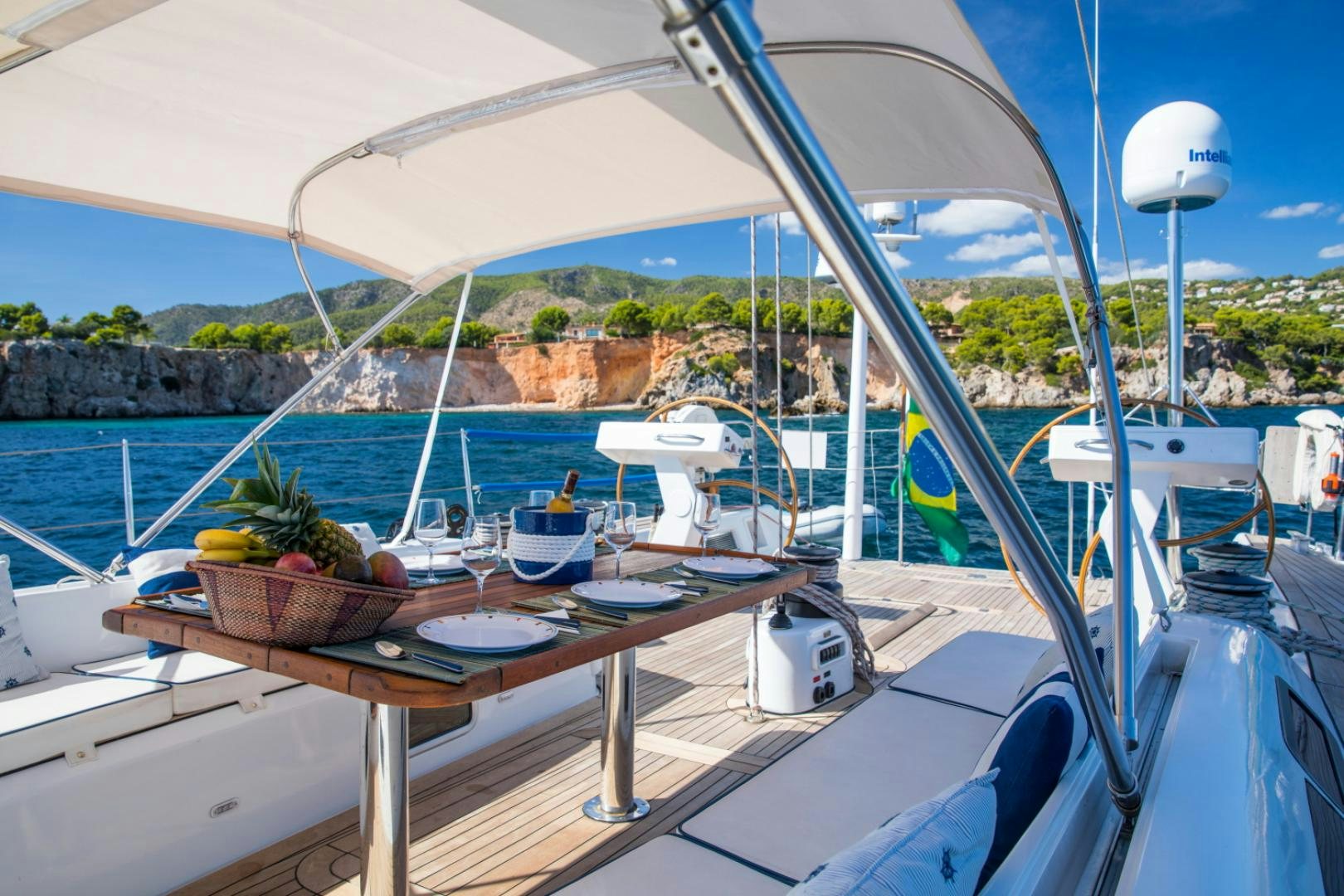 a table with a plant on it aboard INDIGO Yacht for Sale