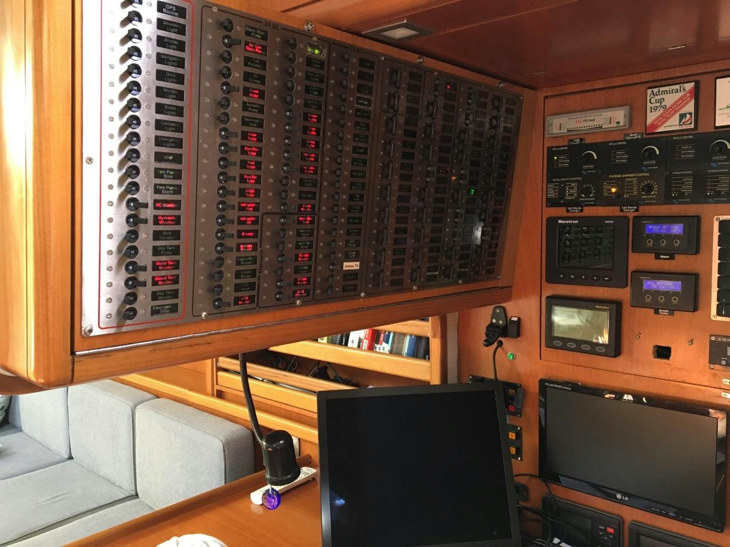 a room with a computer and a tv aboard INDIGO Yacht for Sale
