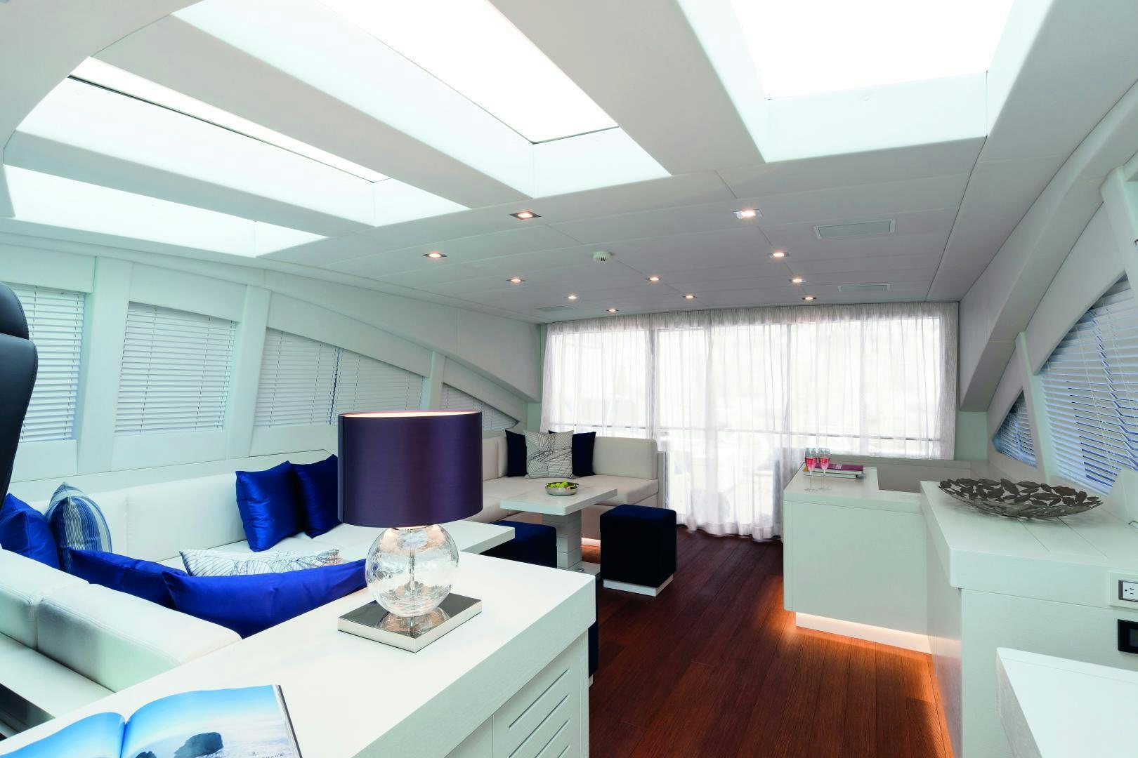 a room with a couch and a table aboard MY TOY Yacht for Sale