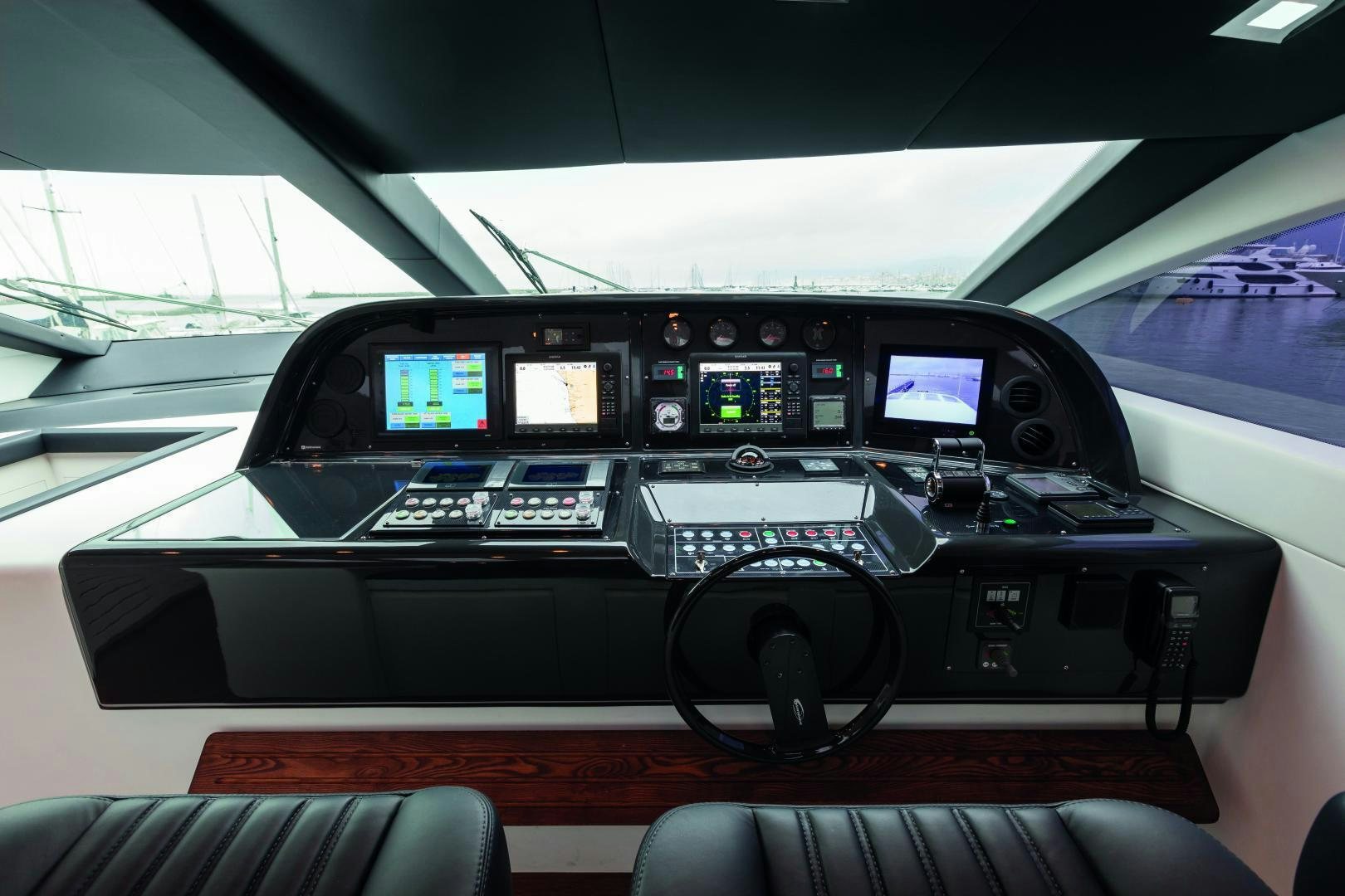 inside of a car aboard MY TOY Yacht for Sale