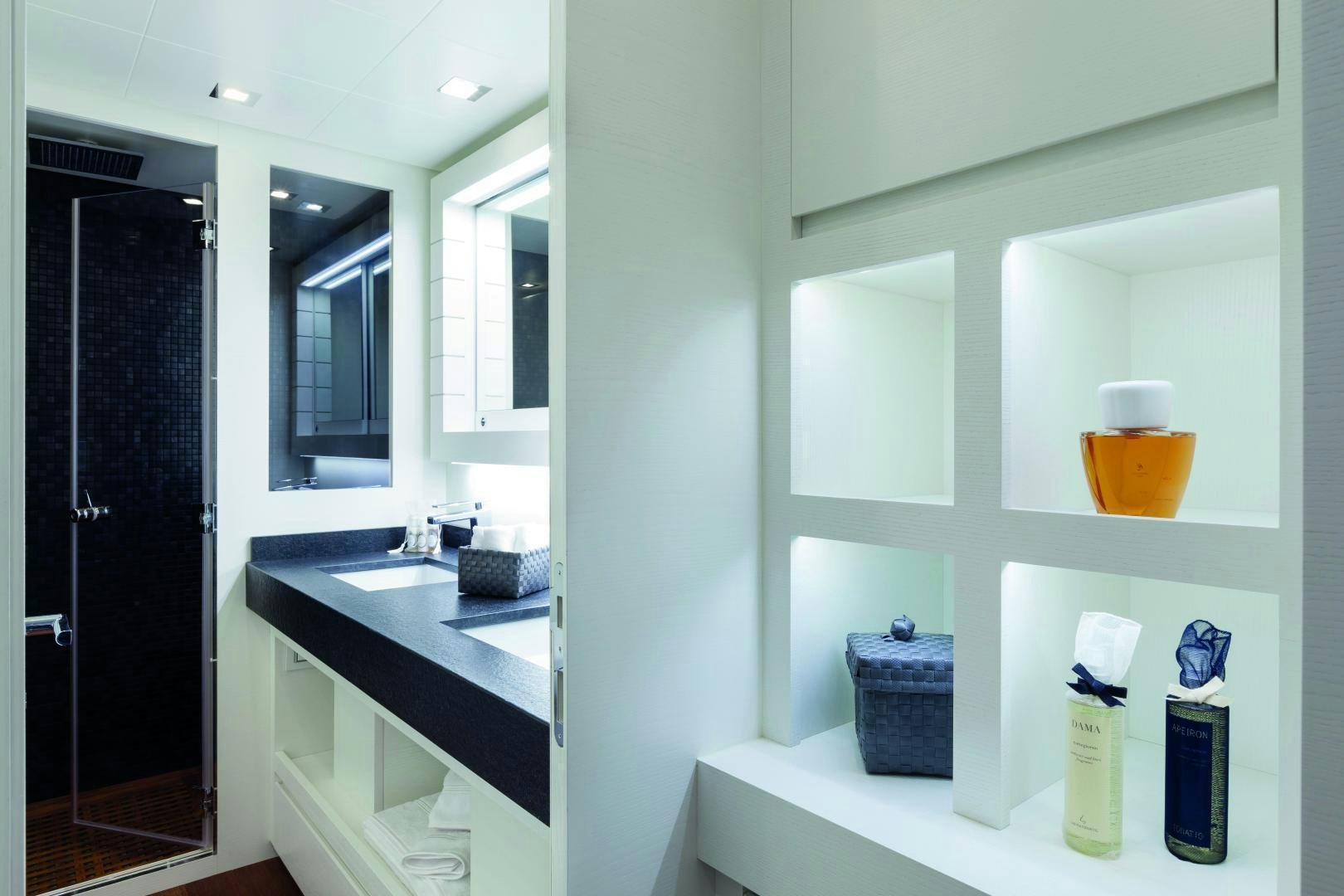 a bathroom with a sink and cabinets aboard MY TOY Yacht for Sale