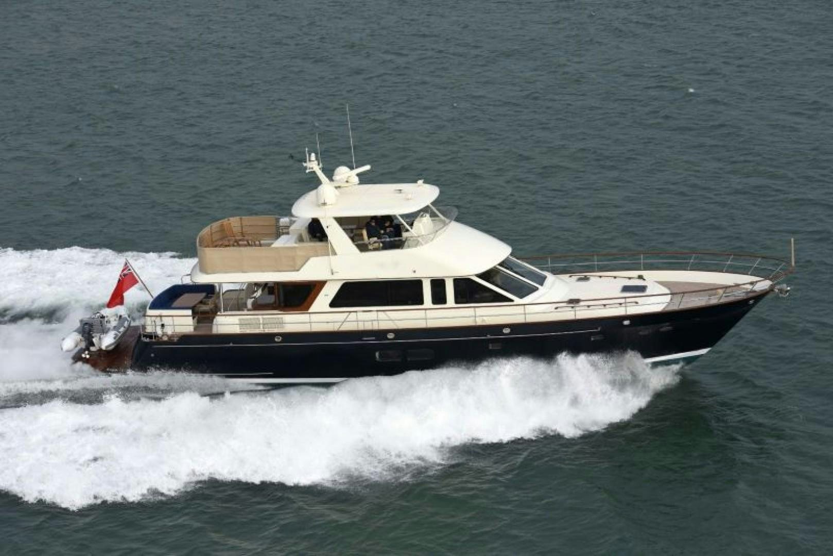 a boat on the water aboard OCEAN 76 Yacht for Sale