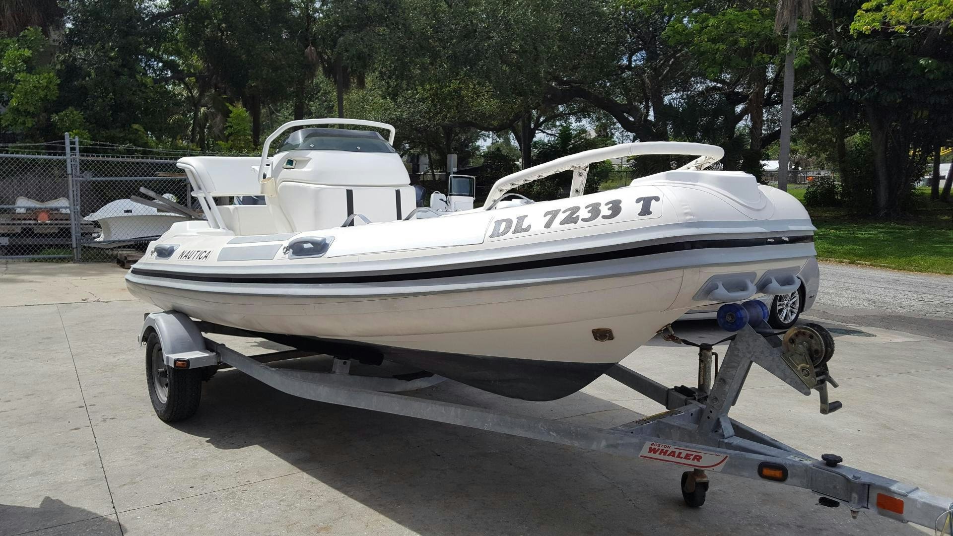a boat on a trailer aboard PRIMETIME III Yacht for Sale