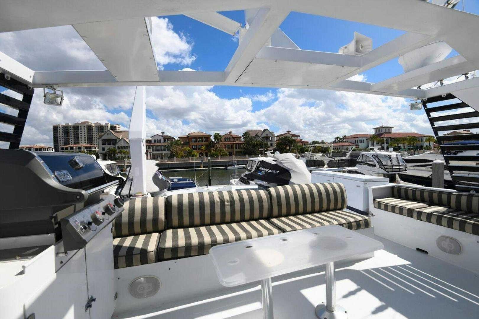 a view of a city from a window aboard PRIMETIME III Yacht for Sale