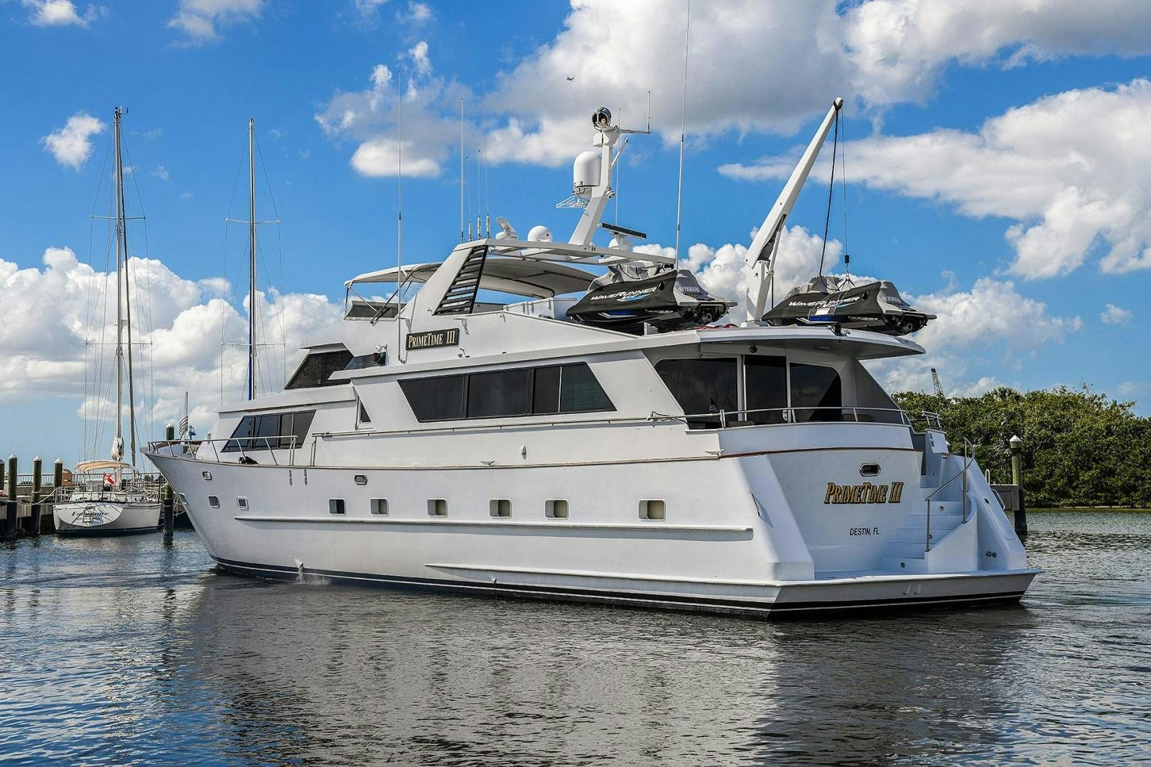 a white boat in the water aboard PRIMETIME III Yacht for Sale