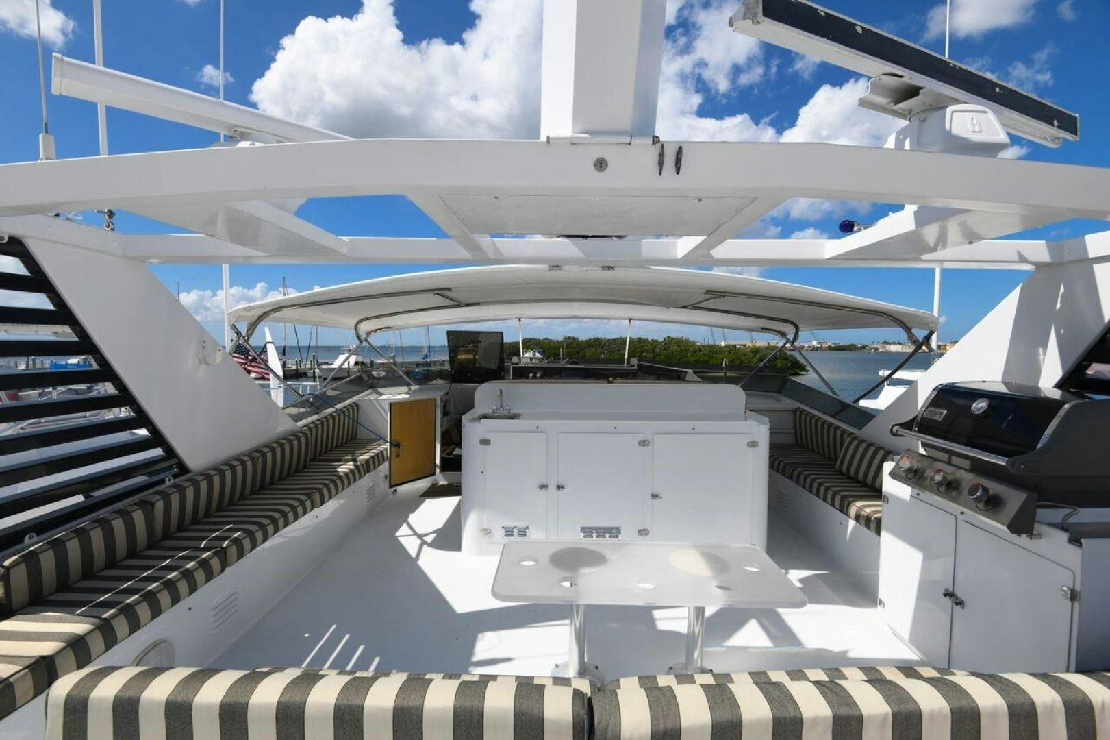 an airplane wing with a staircase aboard PRIMETIME III Yacht for Sale