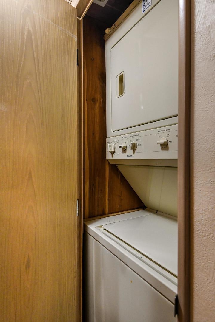 a white washing machine aboard PRIMETIME III Yacht for Sale