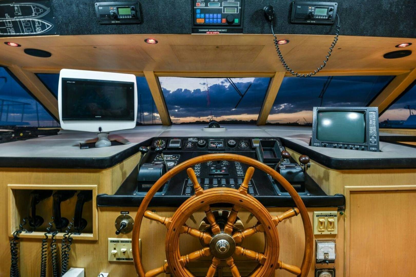 a wooden car with a steering wheel aboard PRIMETIME III Yacht for Sale
