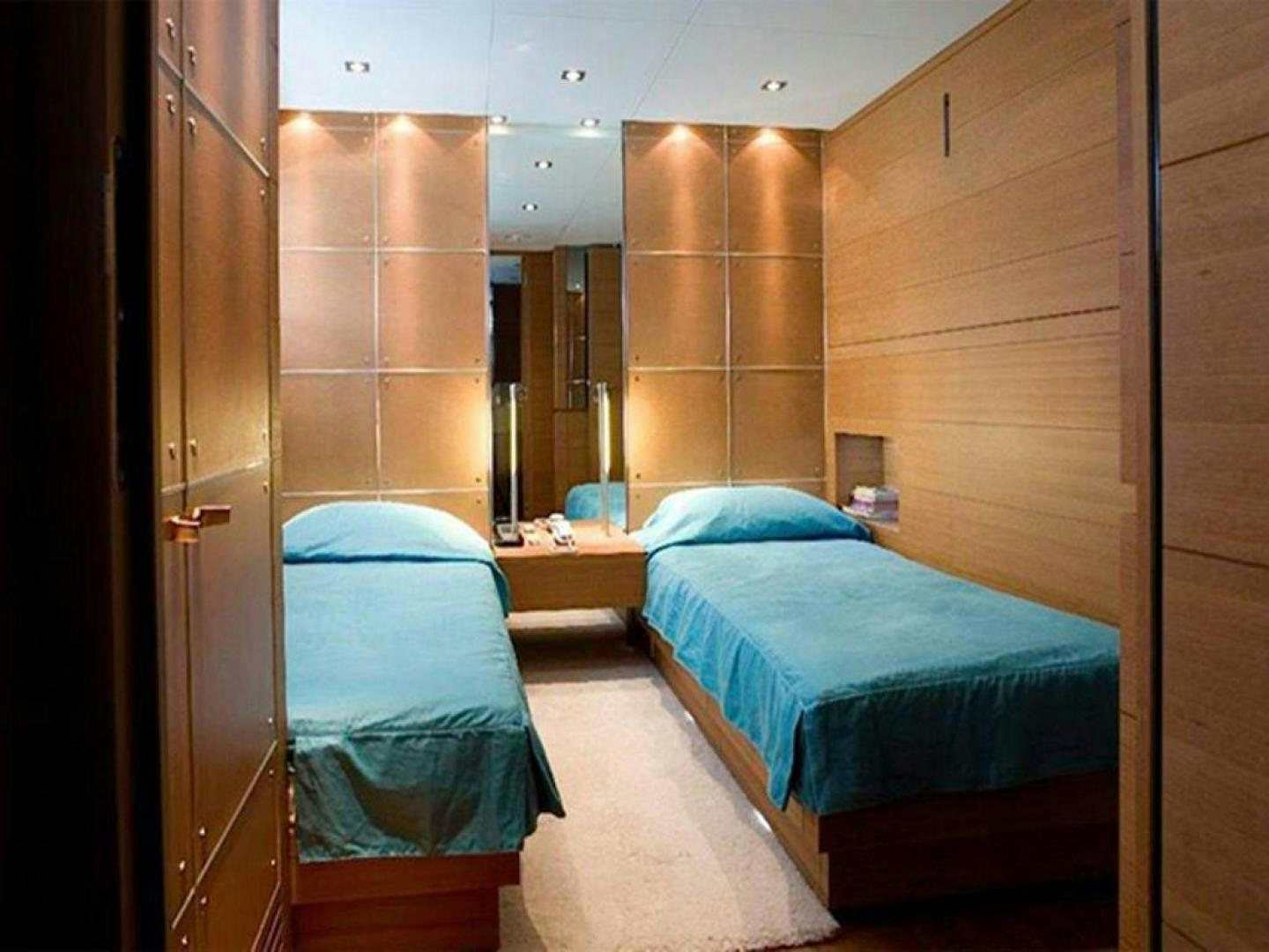 a couple of beds in a room aboard COTE D’AZURE Yacht for Sale