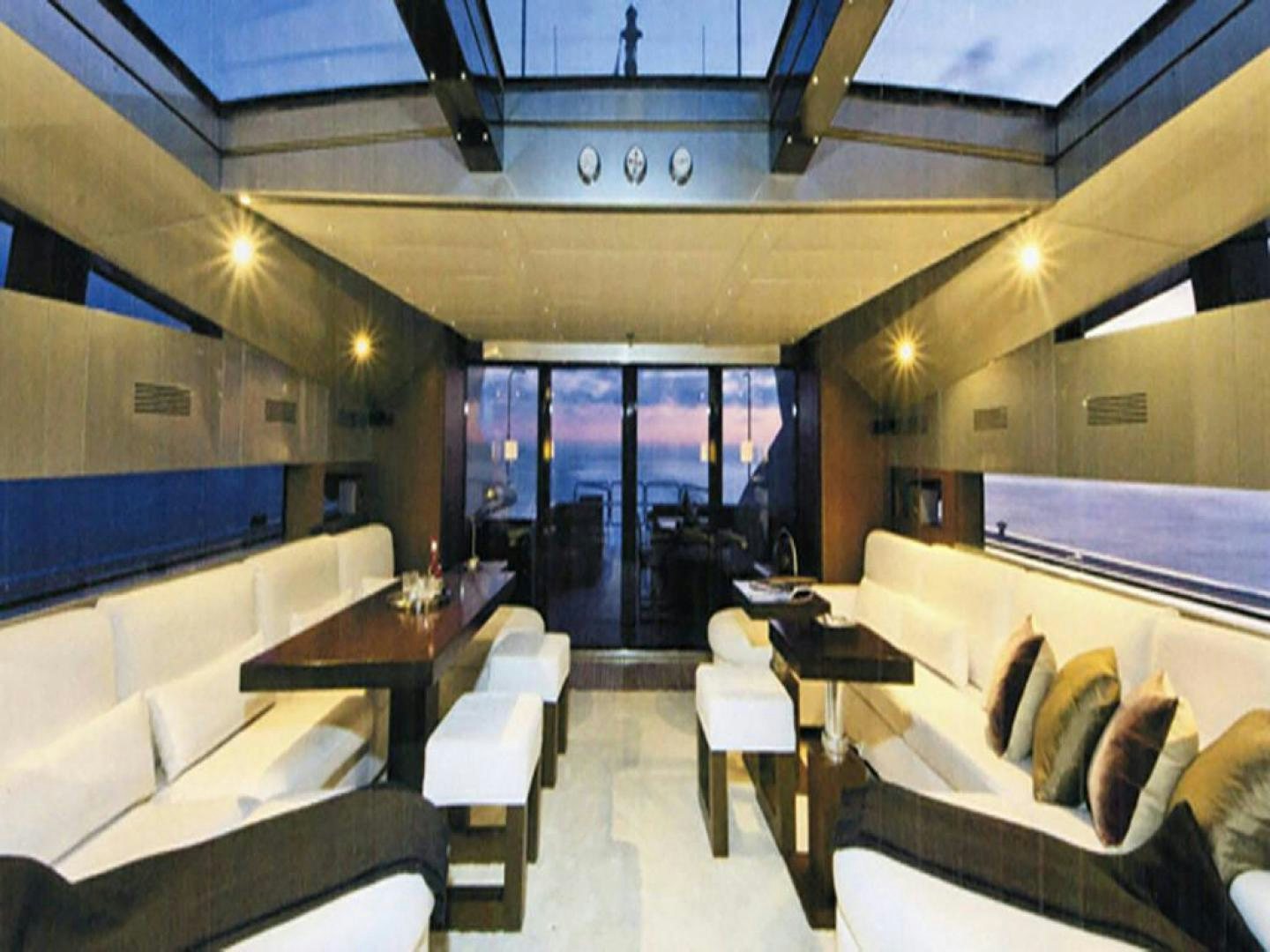 a room with a couch and a table and chairs aboard COTE D’AZURE Yacht for Sale