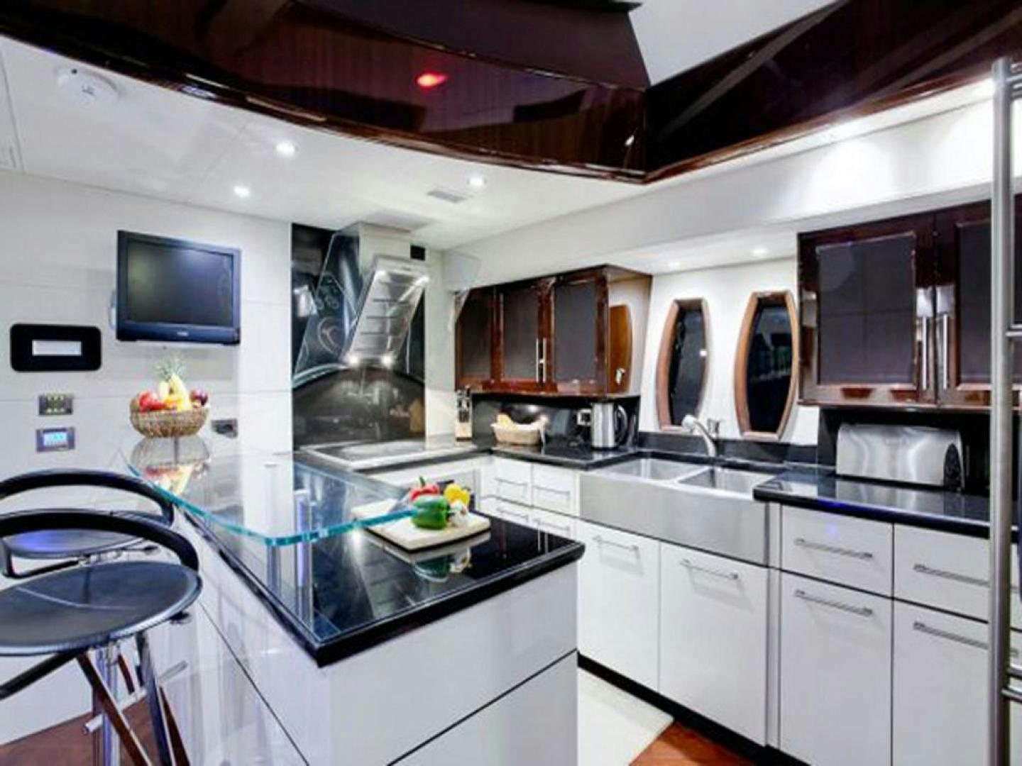 a kitchen with a large island aboard COTE D’AZURE Yacht for Sale