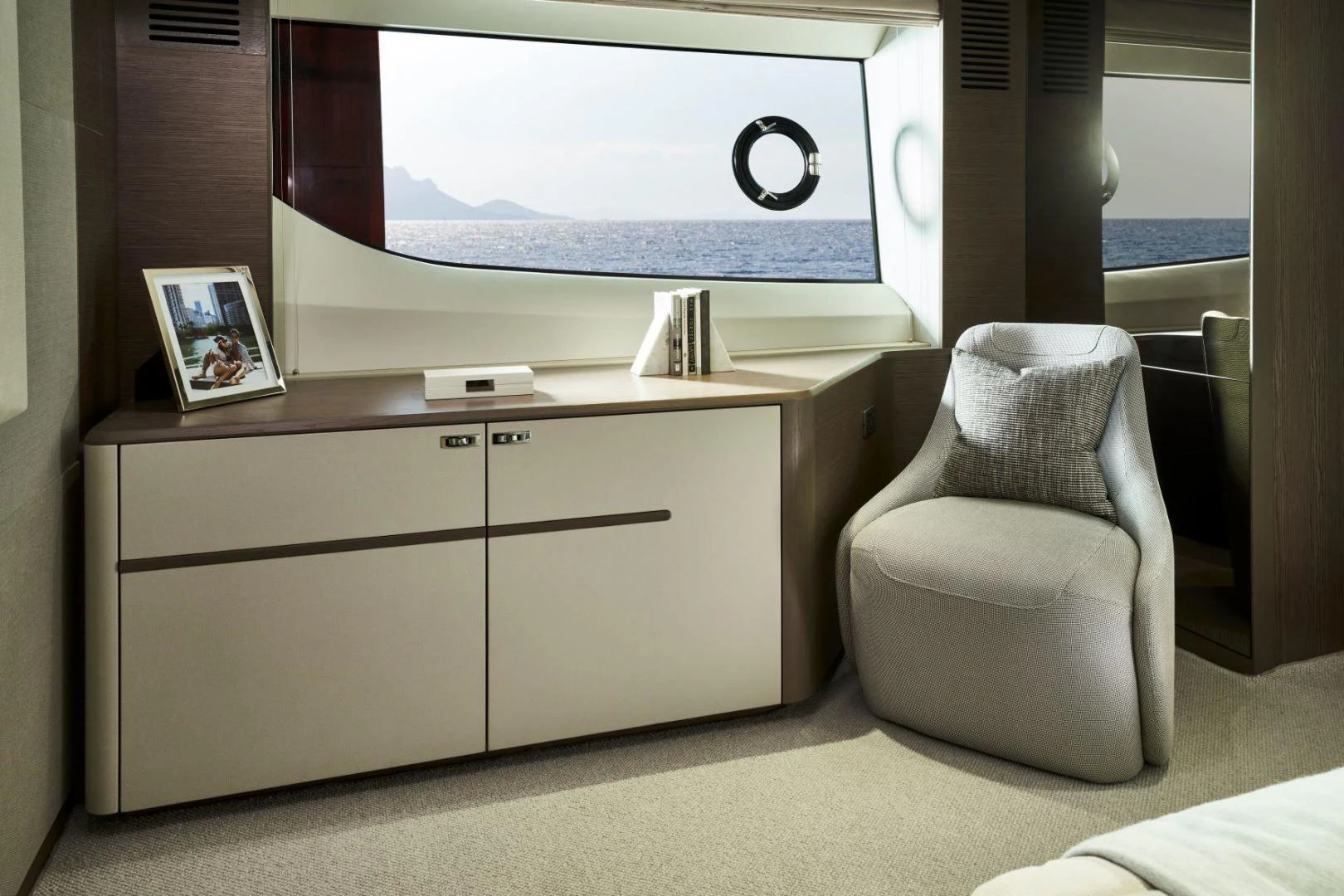 a chair and a television in a room aboard Y85 Yacht for Sale