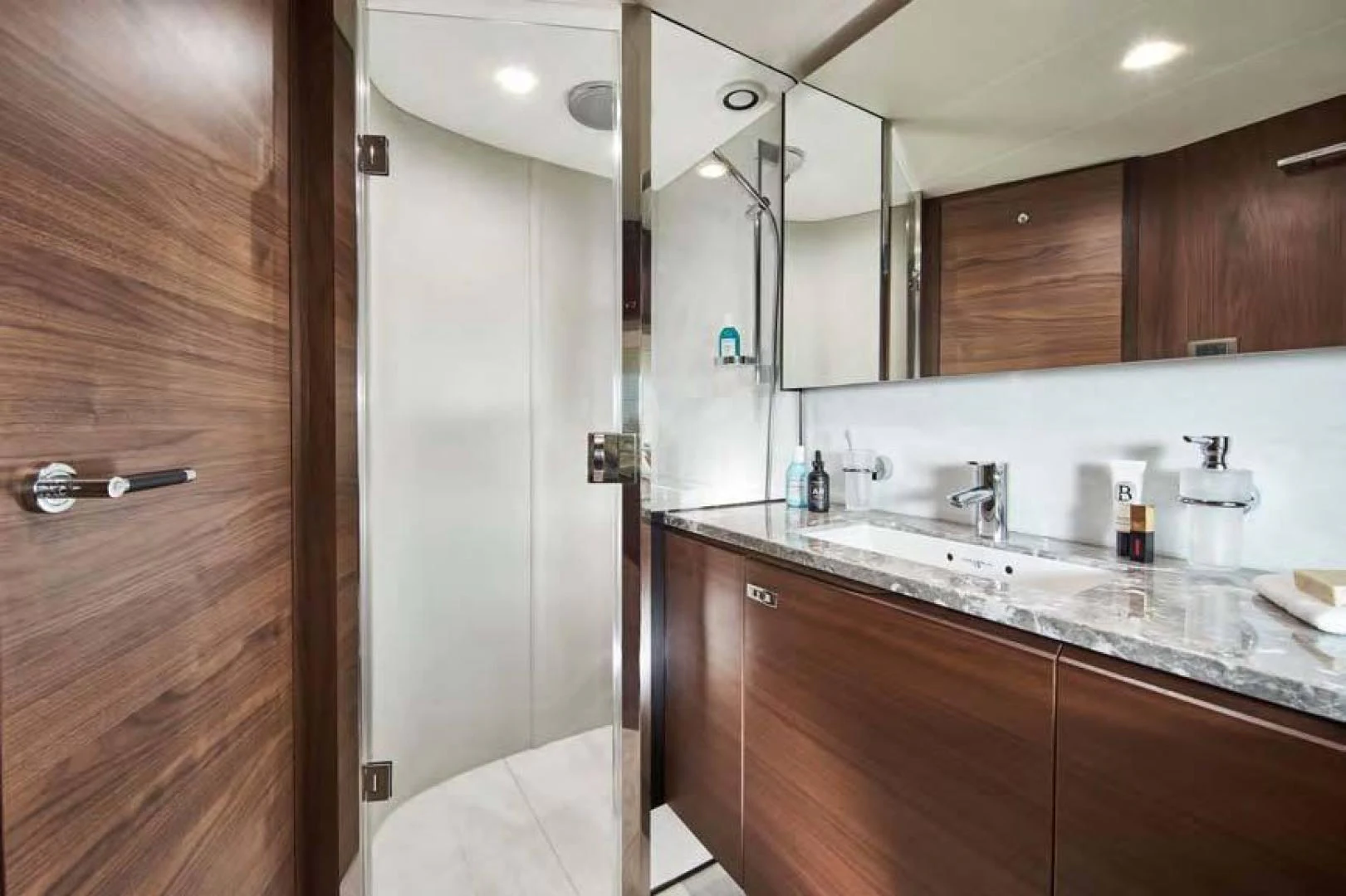 a bathroom with a large mirror aboard Y85 Yacht for Sale