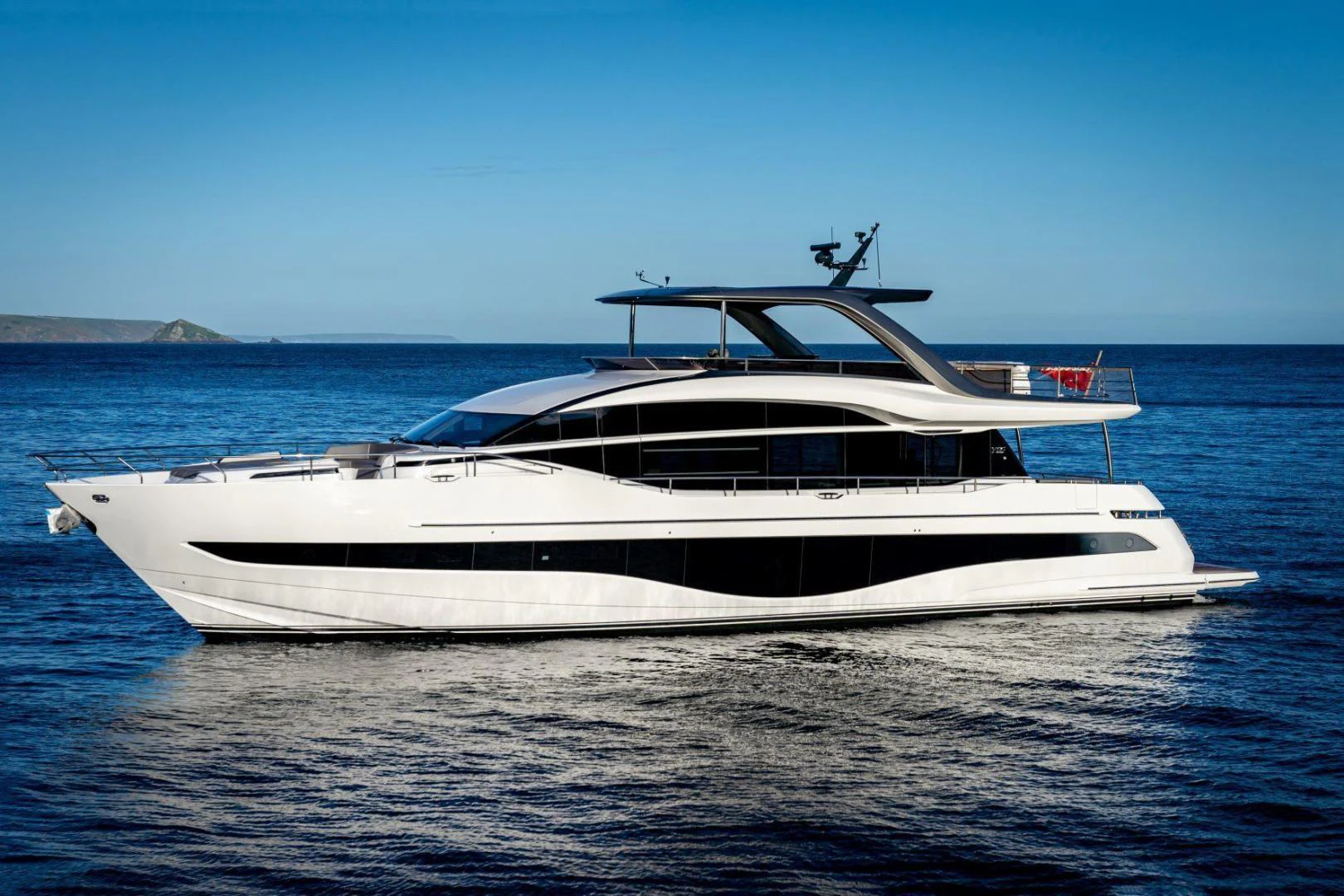 a white yacht in the water aboard Y85 Yacht for Sale