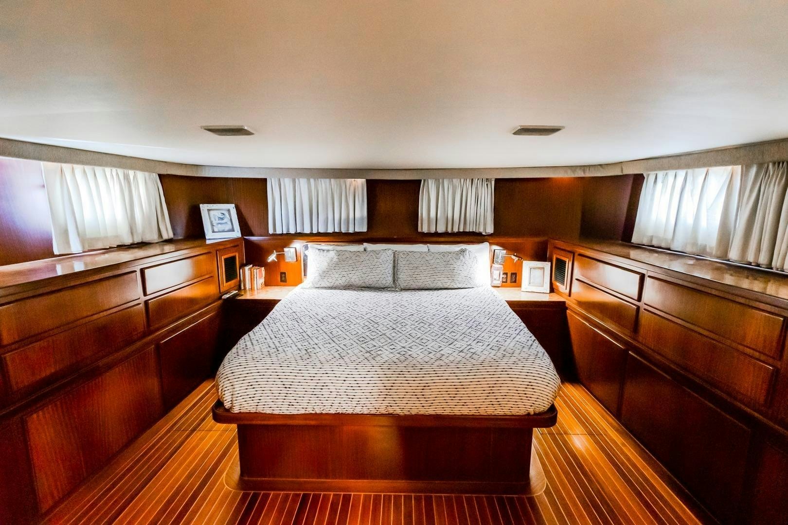 a bed in a room aboard CATCHIN FEELINGS Yacht for Sale