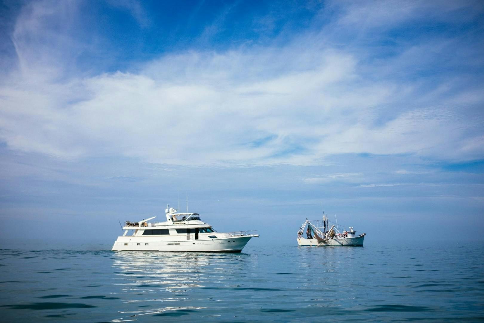 a couple of boats in the water aboard CATCHIN FEELINGS Yacht for Sale