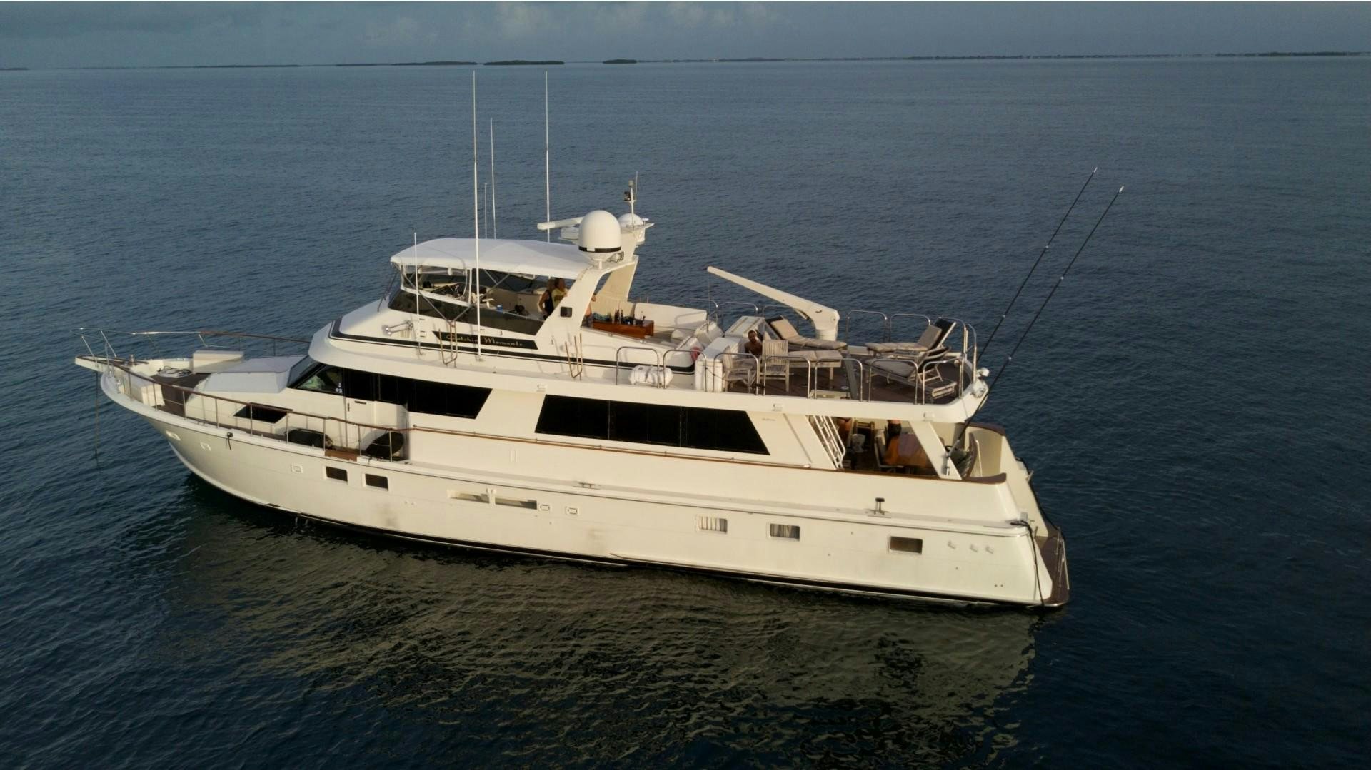 a white yacht in the water aboard CATCHIN FEELINGS Yacht for Sale