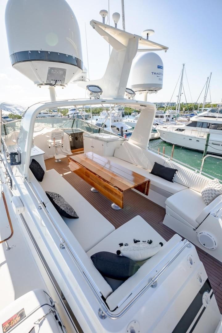 a boat with a satellite dish on the deck aboard CATCHIN FEELINGS Yacht for Sale