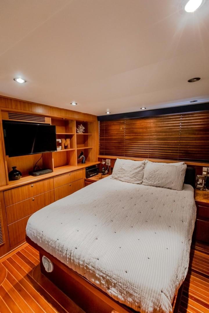 a bed in a room aboard CATCHIN FEELINGS Yacht for Sale