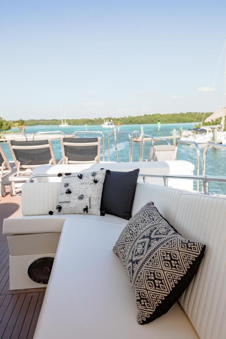 a table with pillows on it aboard CATCHIN FEELINGS Yacht for Sale