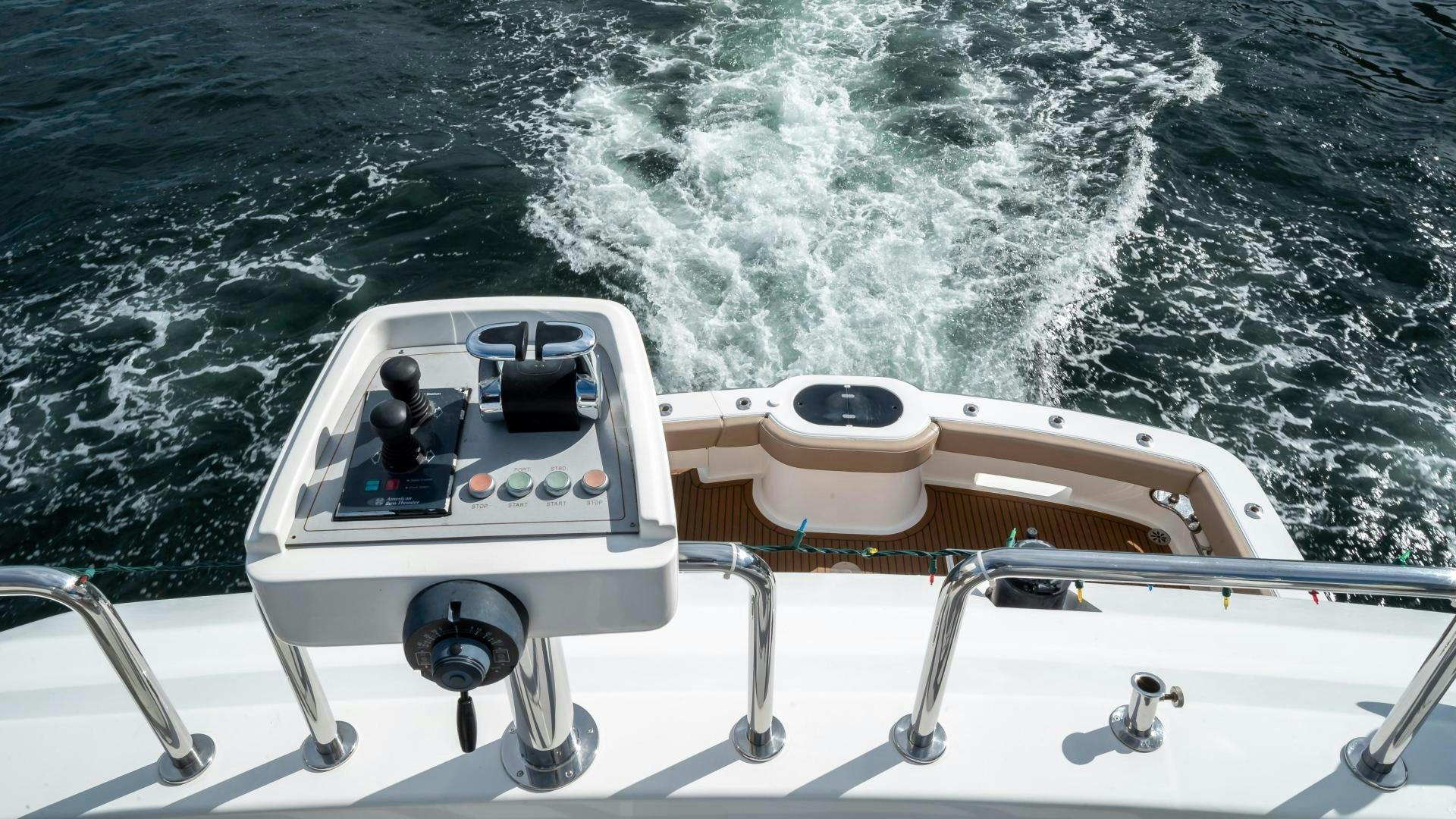a boat with a person in it aboard FULL HOUSE Yacht for Sale