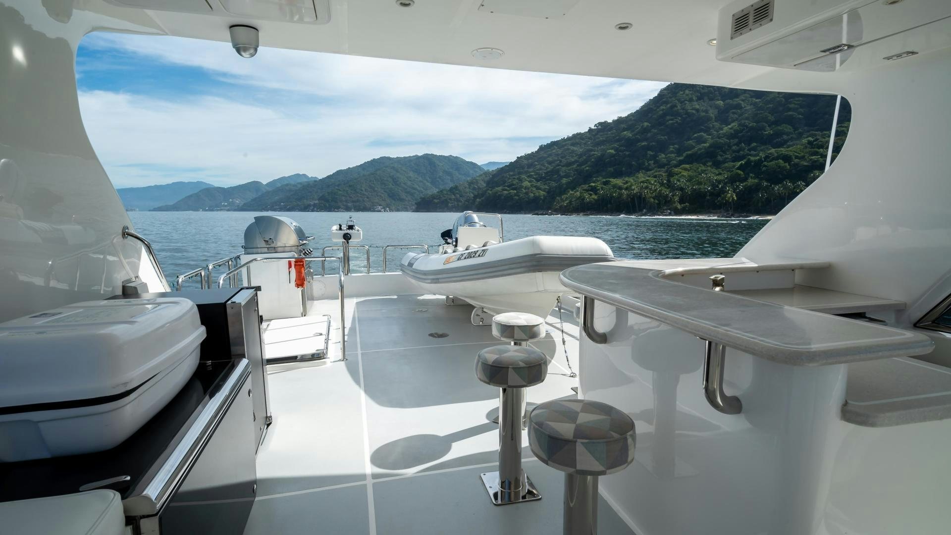 a boat on the water aboard FULL HOUSE Yacht for Sale