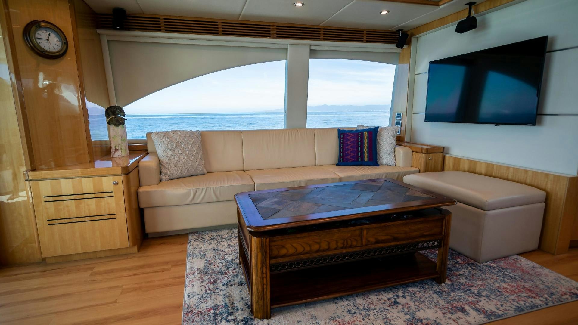 a living room with a large window aboard FULL HOUSE Yacht for Sale