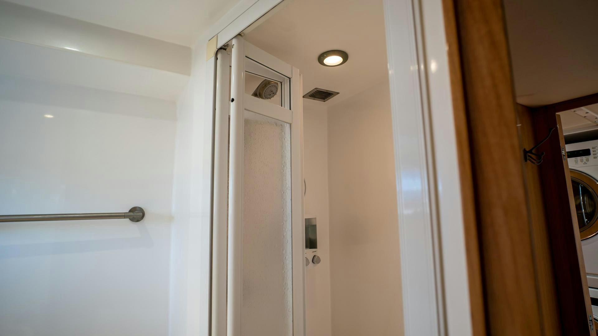 a room with white doors aboard FULL HOUSE Yacht for Sale