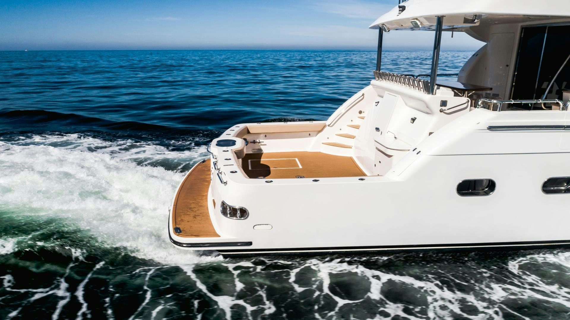 a boat on the water aboard FULL HOUSE Yacht for Sale