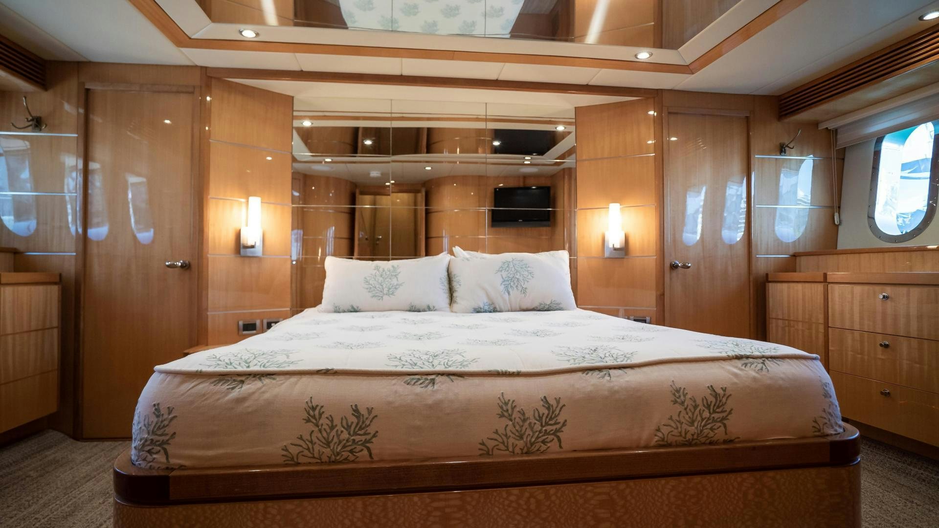 a large bed in a room aboard FULL HOUSE Yacht for Sale