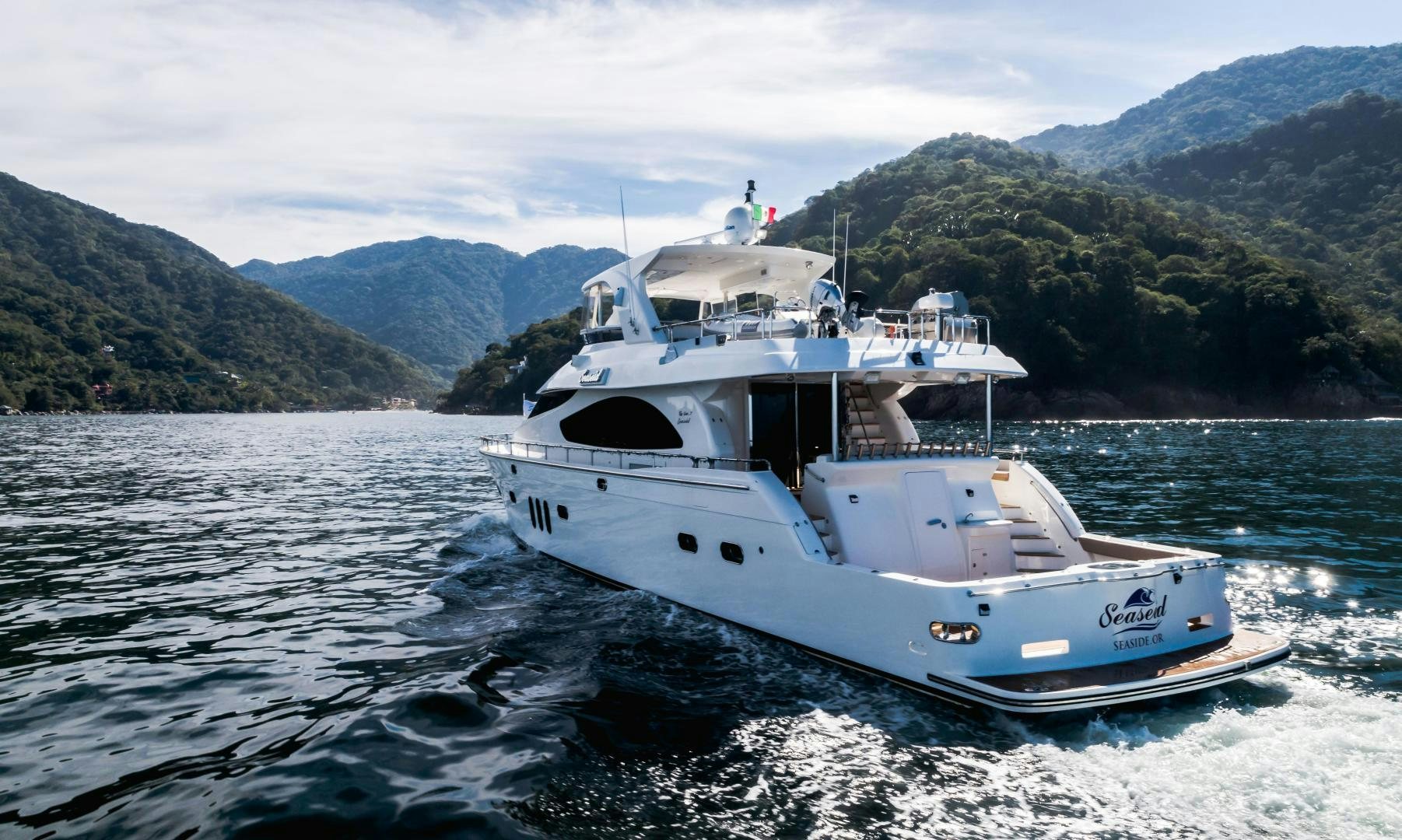 a boat on the water aboard FULL HOUSE Yacht for Sale