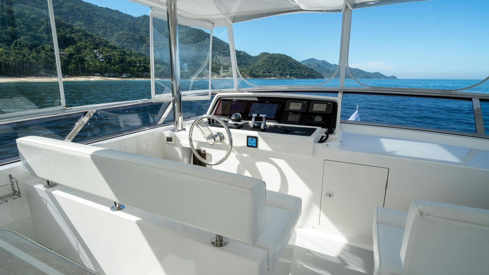 a boat on the water aboard FULL HOUSE Yacht for Sale